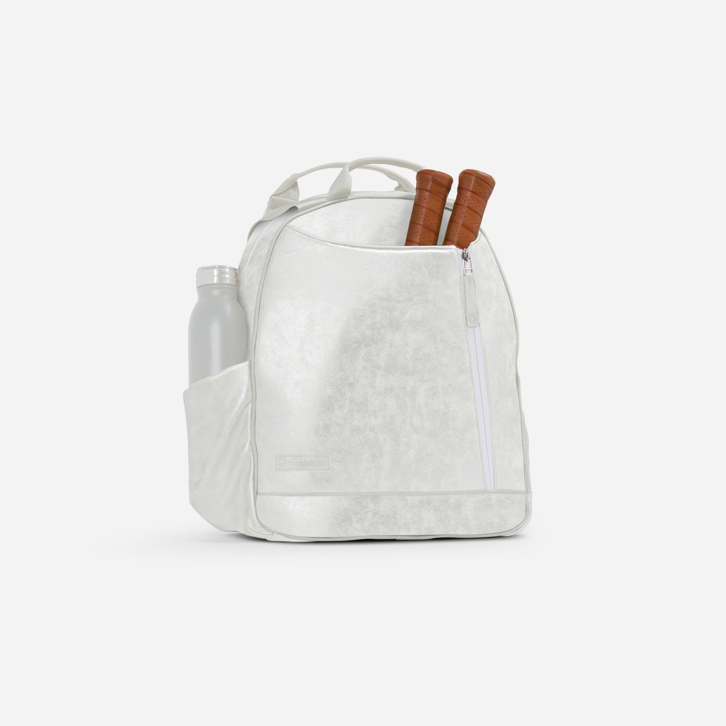 The MELBIE | Pickleball Backpack & Tote by Doubletake is a white bag with organized pockets—a front zippered pocket, side pocket holding a silver water bottle, and two brown-handled jump ropes partially visible. Background is plain white.