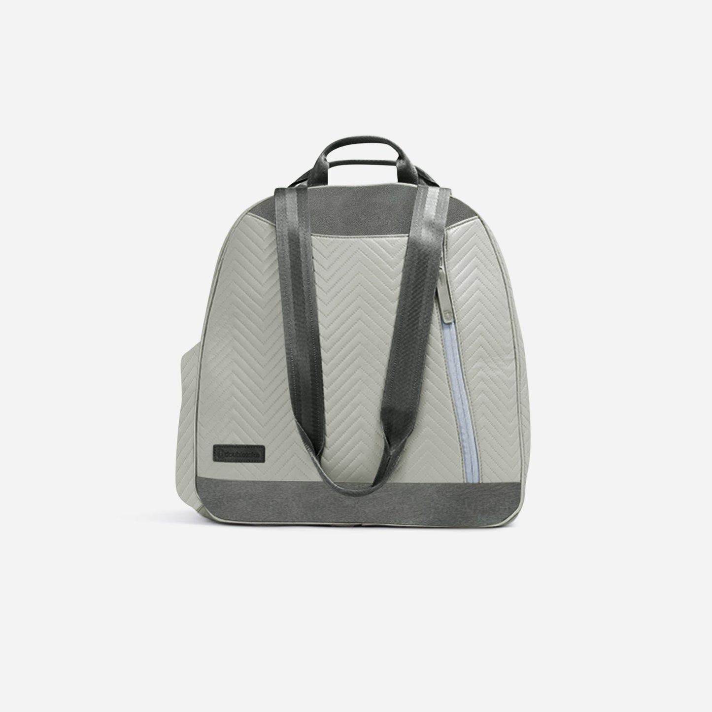 The Doubletake MELBOURNE Pickleball Backpack & Tote is shown in light gray with a quilted chevron pattern, dark gray accents, a front zipper pocket, top handle, and water-resistant finish—all pictured on a plain white background.