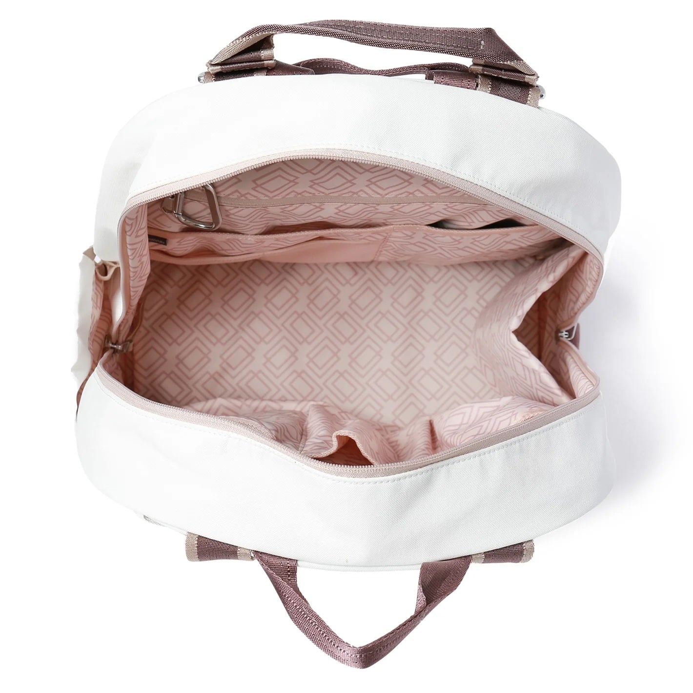 The MELBOURNE Pickleball Backpack & Tote by Doubletake features white exterior, brown handles, an open zipper revealing a spacious, water-resistant interior lined with light pink geometric fabric and multiple side pockets for organization.