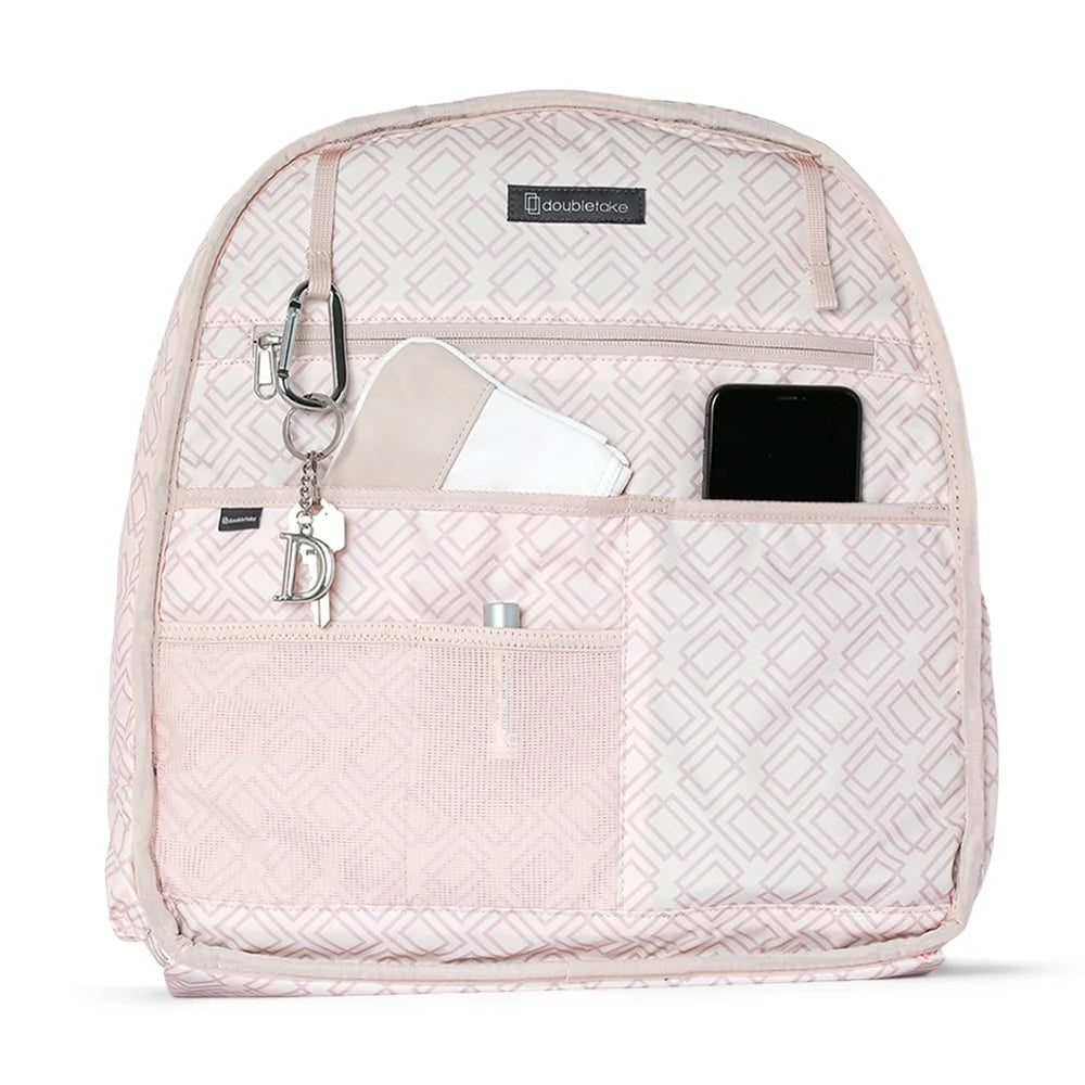 The Doubletake MELBOURNE Pickleball Backpack & Tote in light pink features a geometric pattern, water-resistant design, zipper top, and multiple compartments to securely organize your essentials like a wallet, smartphone, keychain, and pen.