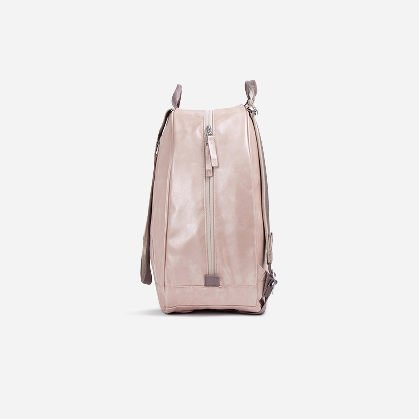 The MELBOURNE | Pickleball Backpack & Tote by Doubletake is shown in light pink leather from the side against a white background, highlighting its tip-free design, vertical zipper pocket, top handle, adjustable straps, and minimalist look.