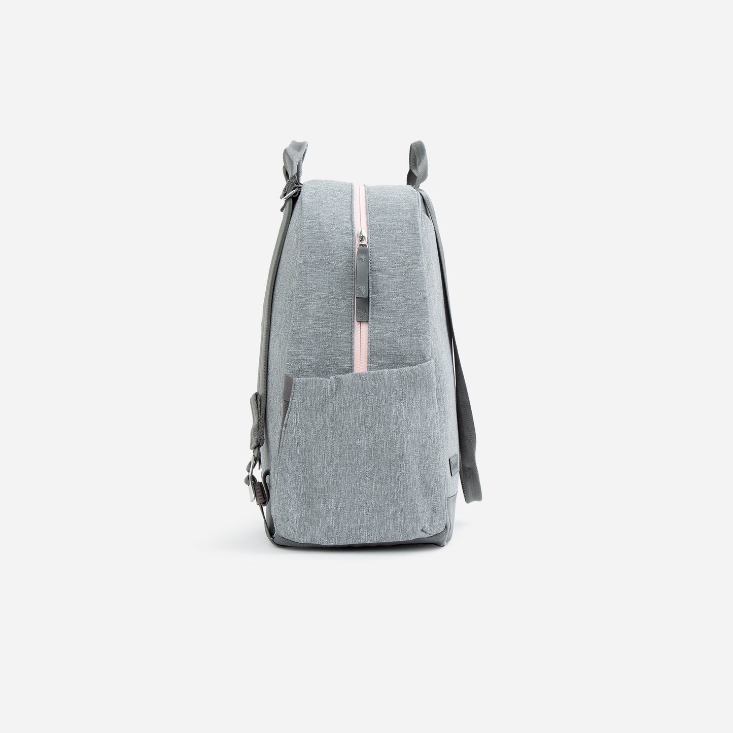 The Doubletake MELBOURNE Pickleball Backpack & Tote features a modern gray design with a light pink vertical zipper, front pocket, and adjustable shoulder straps. Its tip-free base stands upright, showcasing its minimalist look and clean lines.