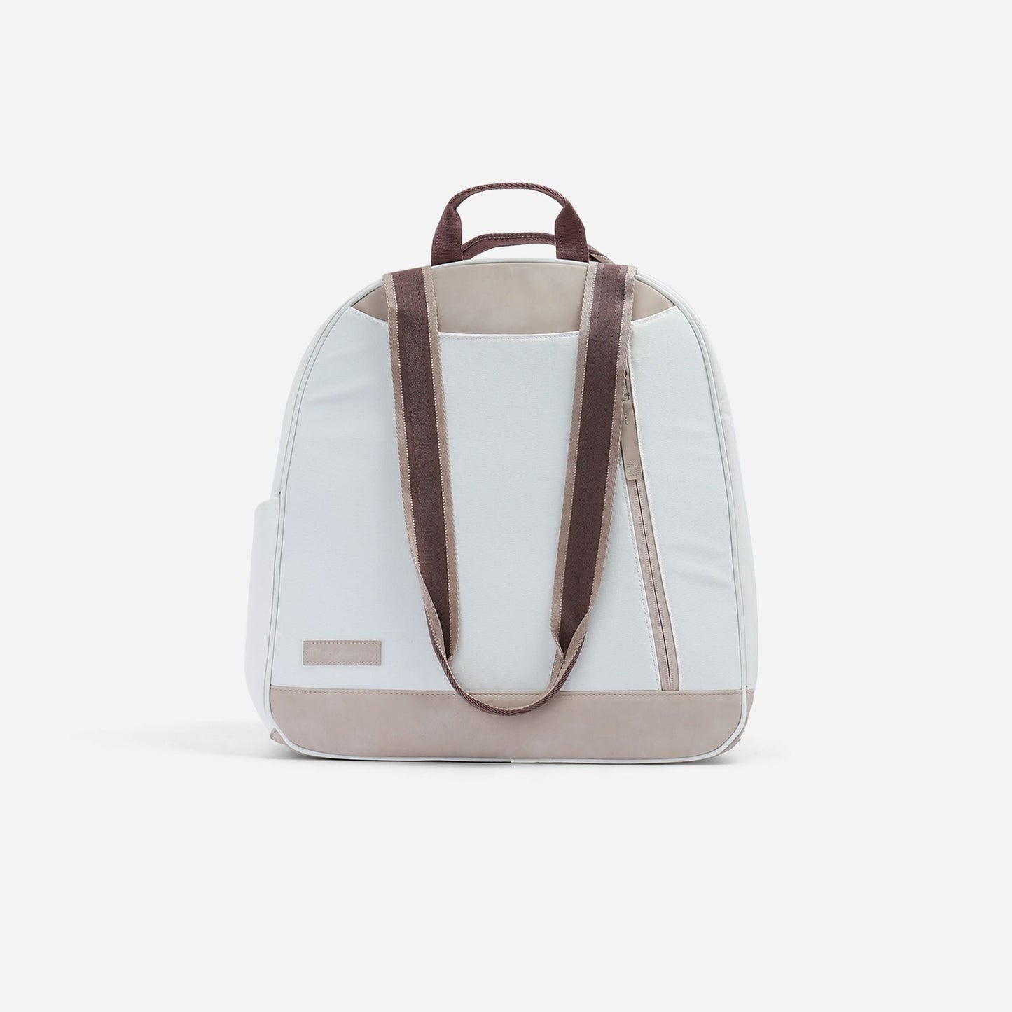 The Doubletake MELBOURNE Pickleball Backpack & Tote is a modern white bag with beige and brown accents, tip-free design, top handle, two adjustable brown shoulder straps, front beige strip, and small rectangular patch on a plain white background.