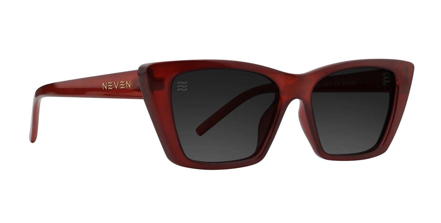 Espresso cat-eye sunglasses by Neven Eyewear feature a glossy mahogany brown frame, black polarized UV400 lenses, and the NEVEN logo in gold on the left temple—blending retro style with bold, modern flair.
