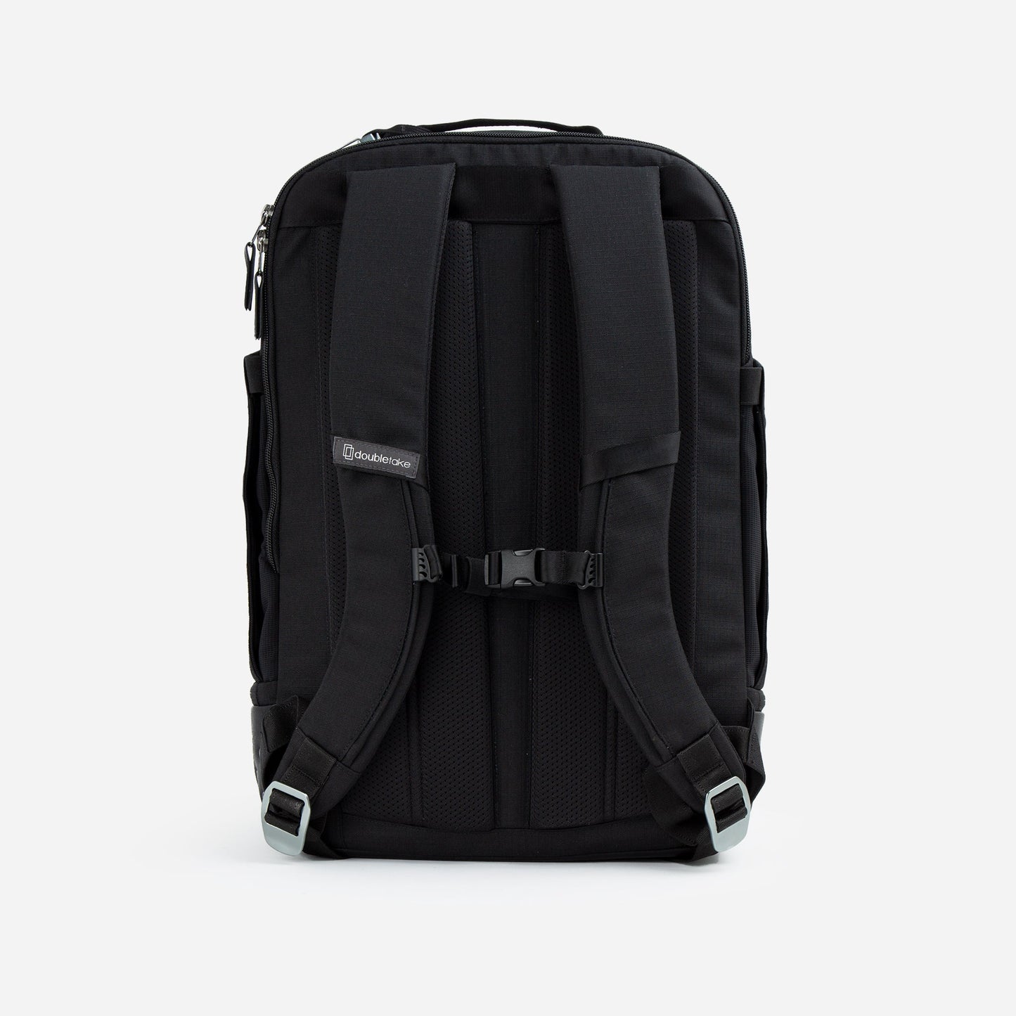 The Doubletake NYC Pickleball Backpack is shown standing upright against a white background, highlighting its padded back support, adjustable shoulder straps with chest buckle, and paddle compartments for stylish gear transport.
