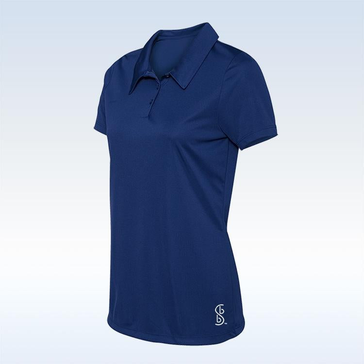 A women's navy blue collared polo with three buttons and a white embroidered logo pairs perfectly with the Pickleball Bella United We Par-Tee Straight Golf Skort by Pickleball Bella. Shown on a simple gradient background.