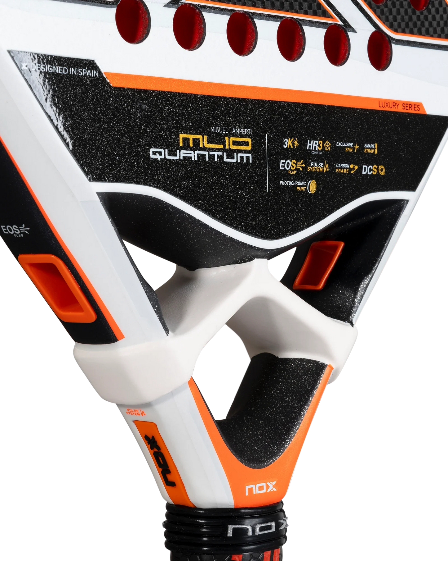 Close-up of the Nox ML10 QUANTUM 3K by Padel USA, Miguel Lamperti's racket. Features black, white, and orange details, prominent branding, a 3K carbon fiber bridge, and a textured surface for enhanced play.