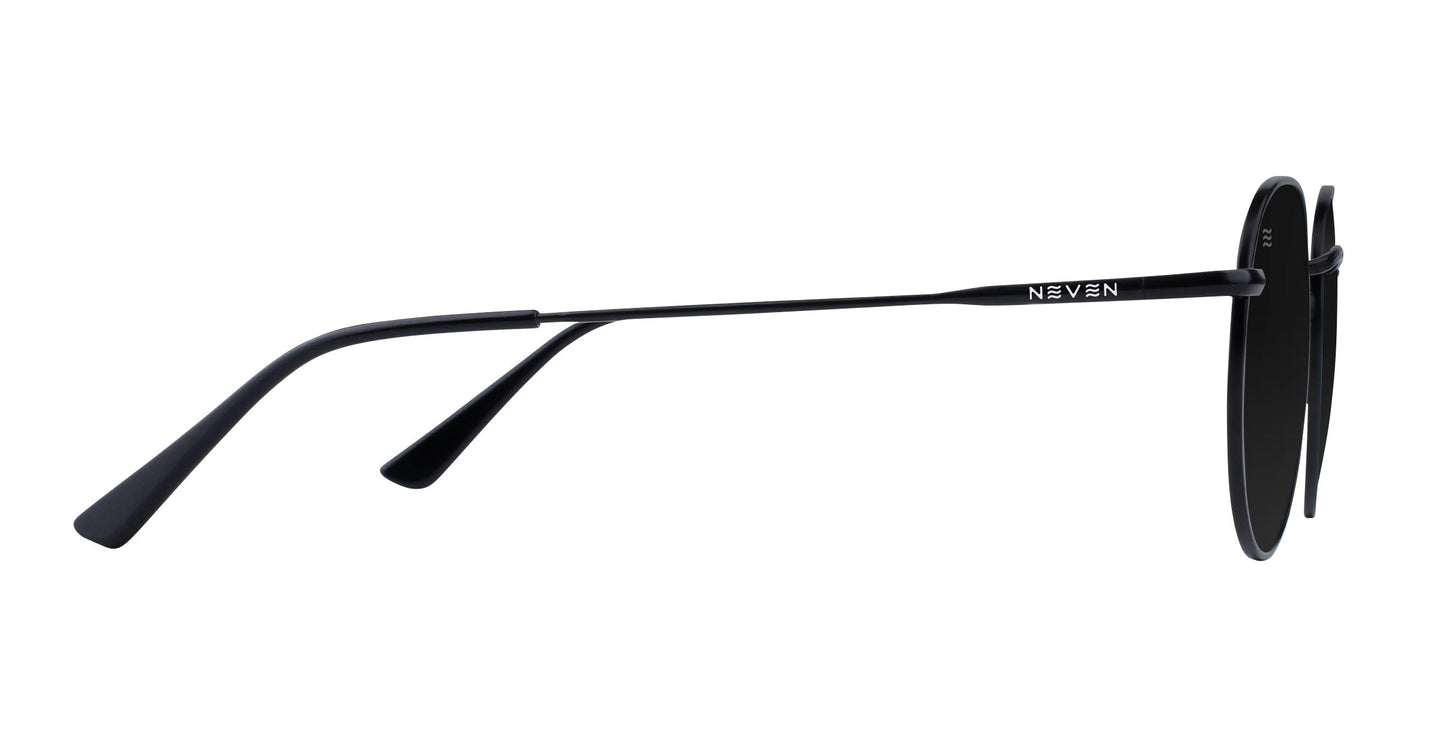 Side view of Saint sunglasses by Neven Eyewear, featuring thin metal frames, black temples, and dark polarized UV400 lenses. The brand name "Neven" is printed in white near the hinge, with slightly curved arm tips for comfort.