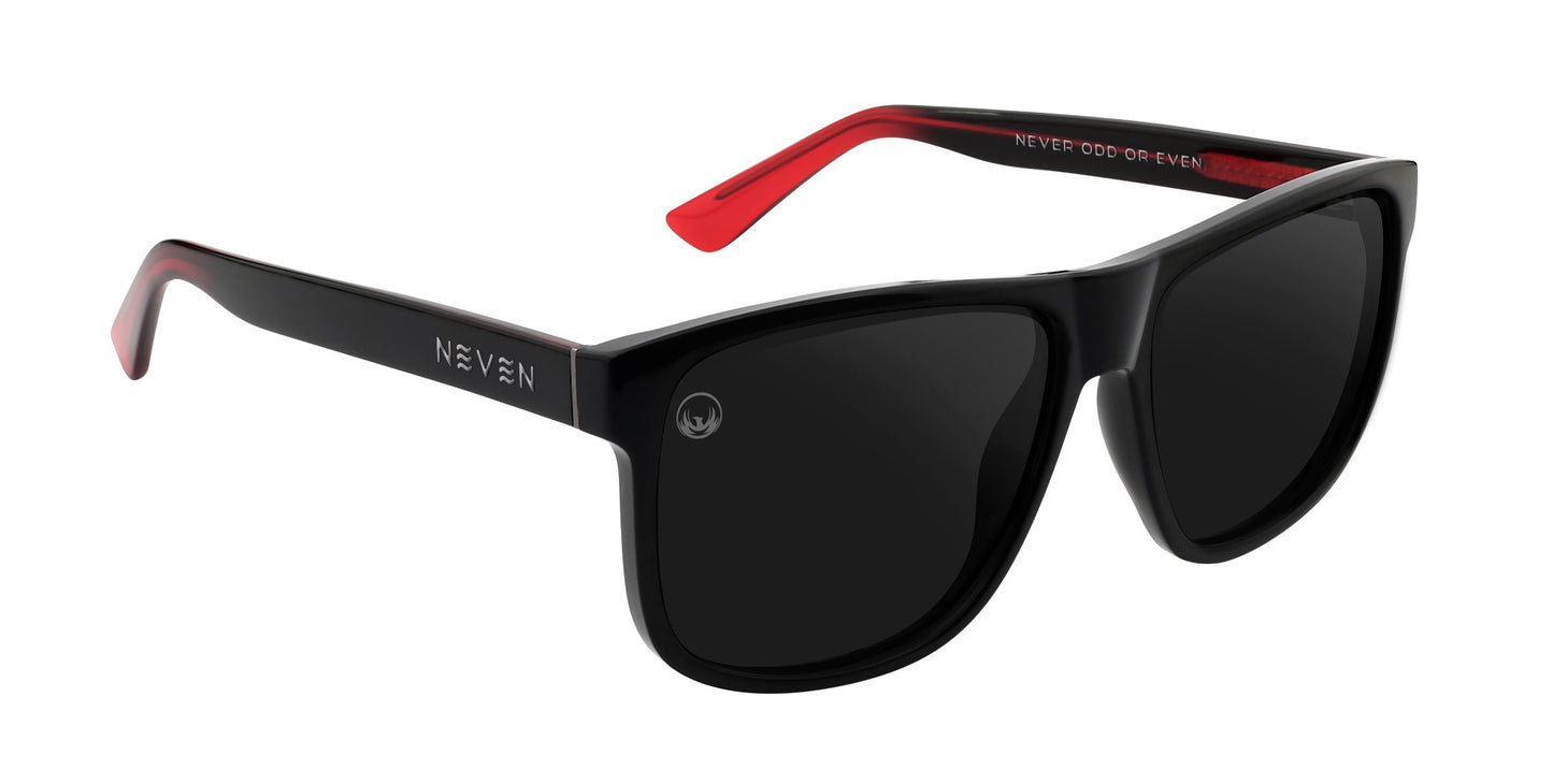 The Neven Eyewear Ignite sunglasses feature large, rectangular polarized lenses, a black frame with red-tipped arms, “NEVEN” branding, and the phrase “NEVER ODD OR EVEN” on the inner arm.