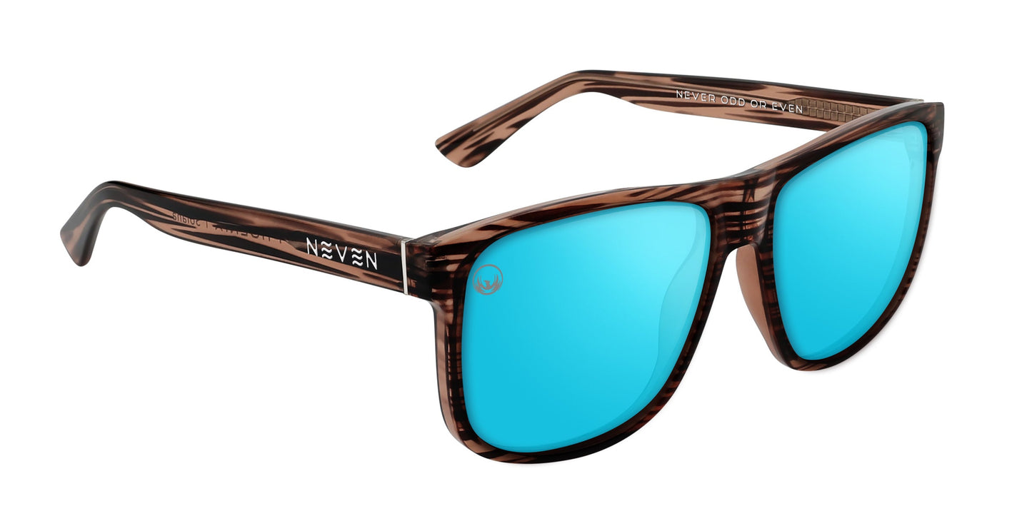 The Solana sunglasses from Neven Eyewear's Phoenix Collection feature a brown wood-grain frame, bright blue mirrored polarized lenses, and the Neven logo in white on the left temple arm, shown against a white background.