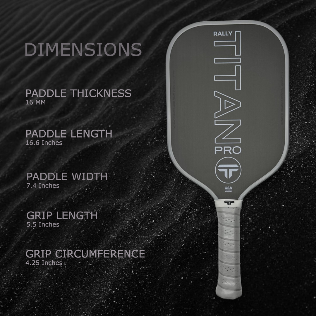 A gray Rally Titan Pro 16MM paddle by Rally Titan Pickleball stands upright with white text. Specs on the left: thickness 16mm, length 16.6in, width 7.4in, grip length 5.5in, grip circumference 4.25in. Dark wavy sand background.