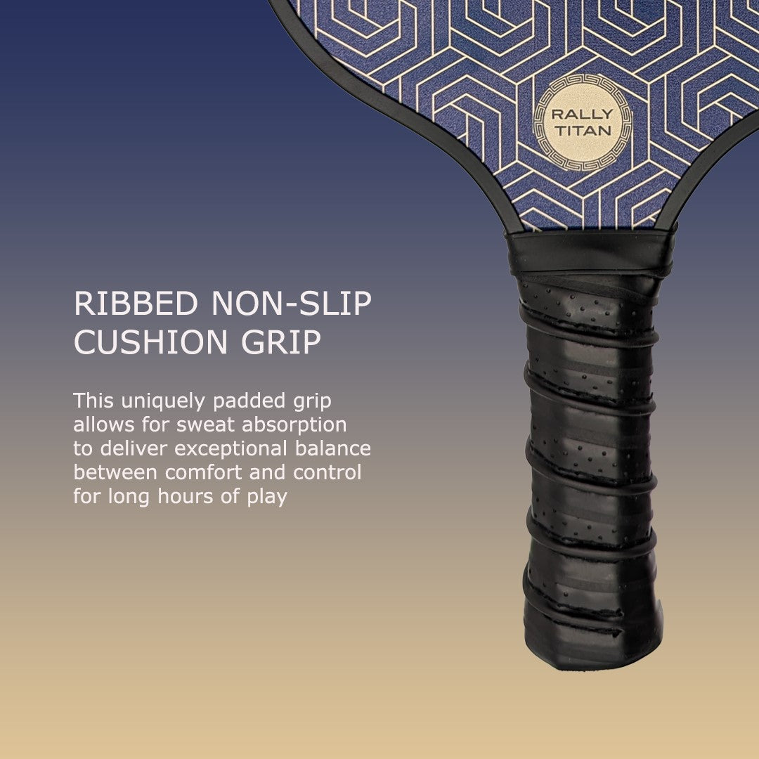 Close-up of the Rally Titan Pickleball Blue Hex paddle handle with a black, ribbed cushioned grip. The T300 textured carbon fiber face has a blue geometric pattern. Non-slip grip ensures sweat absorption, comfort, and control during play.