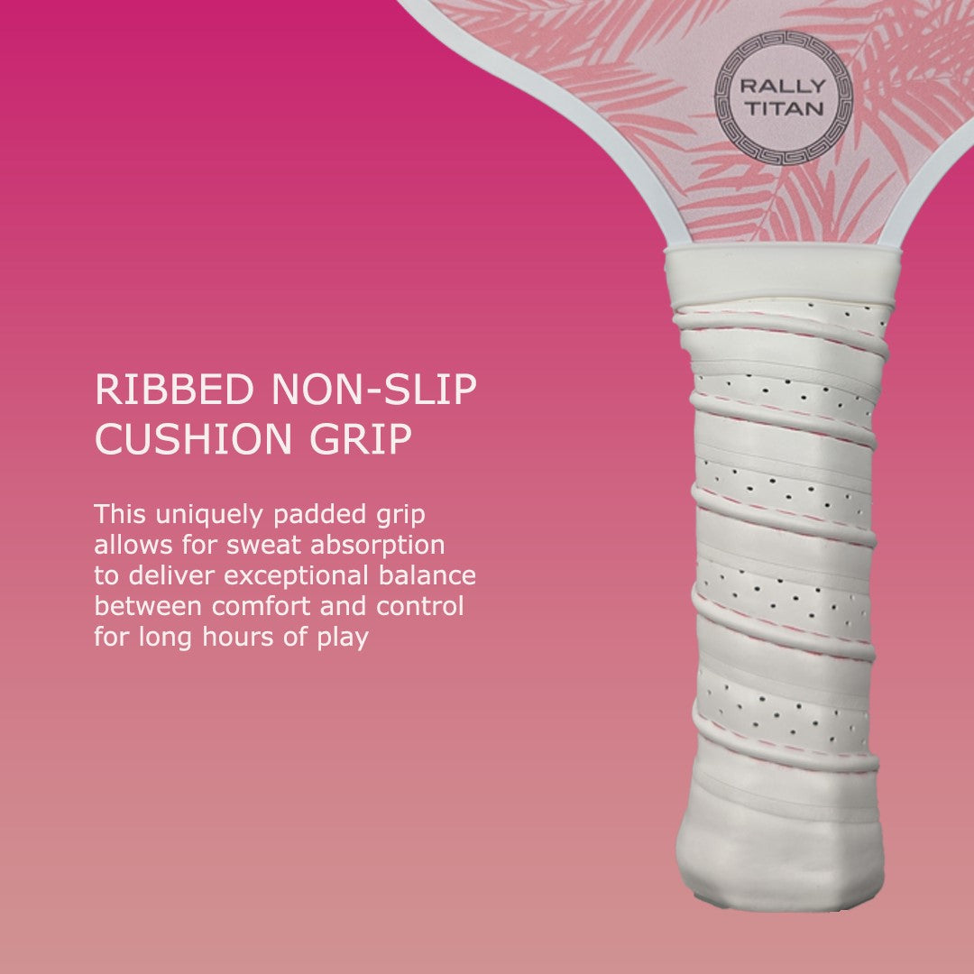 Close-up of a pink Malibu paddle by Rally Titan Pickleball with a ribbed, perforated, cushioned white grip. Text highlights its non-slip, sweat-absorbing comfort and control. Features 10MM T300 textured carbon fiber & honeycomb core. Pink gradient background.