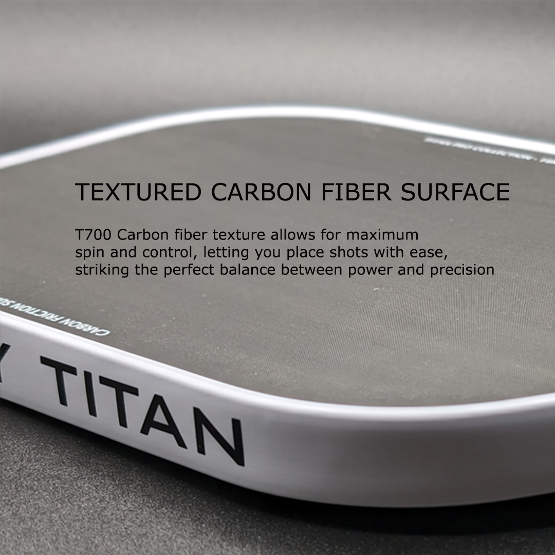 A detailed close-up showcases the Rally Titan Pickleball Titan Pro Control paddle’s T700 carbon friction textured surface, 16MM polypropylene honeycomb core, white trim, and TITAN branding, signaling its USAPA-approved status.