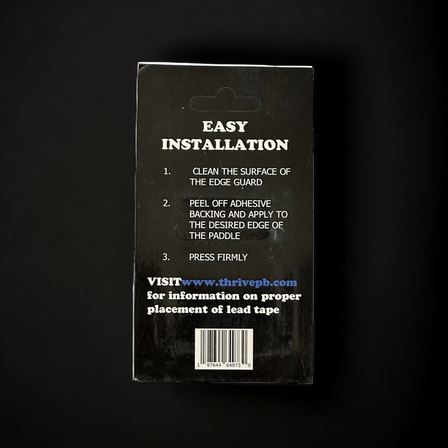A black Thrive Pickleball Lead Tape package shows EASY INSTALLATION steps in white: 1. Clean the edge guard. 2. Peel adhesive and apply to adjust paddle weight. 3. Press firmly. The barcode and website are also visible on the package.