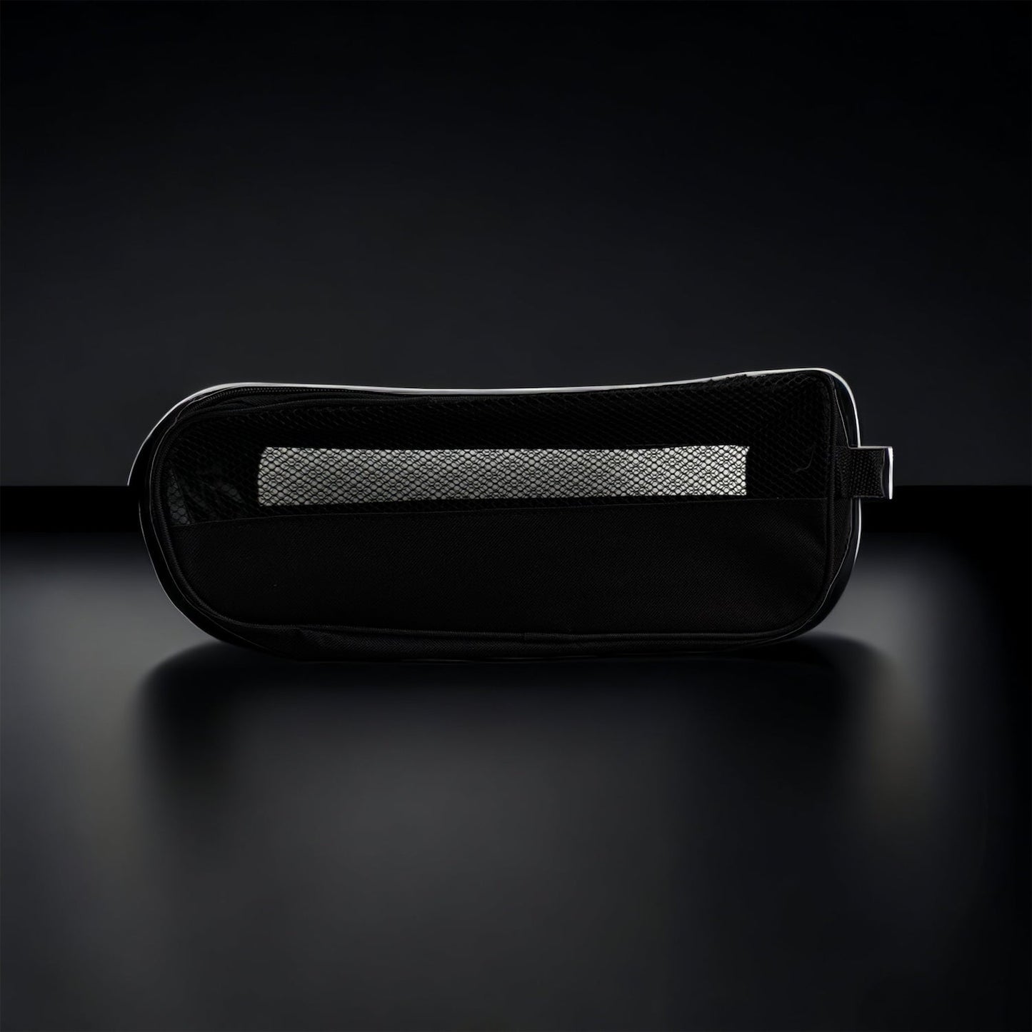 The THRIVE Shoe Bag (Size 12 and Under) by Thrive Pickleball, a black zippered bag with mesh panel and side loop, is centered against a dark gradient background, its mesh revealing part of the interior.