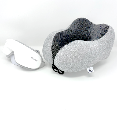 A gray ergonomic neck pillow with a black mesh center sits next to a white iReliev Relaxable™ Eye Massager with Heat. Both items, each displaying the iReliev brand logo, rest on a plain white background.