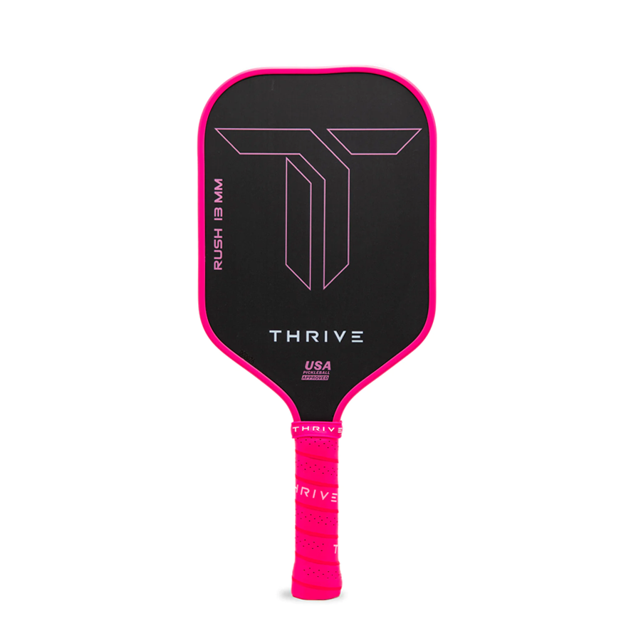 The RUSH 13 (PINK) by Thrive Pickleball is a black elongated paddle with neon pink edges, large T logo, and THRIVE branding. Made from TORAY T700 carbon fiber for power and control. Includes cover, weights, eraser, card. USA Pickleball Approved.