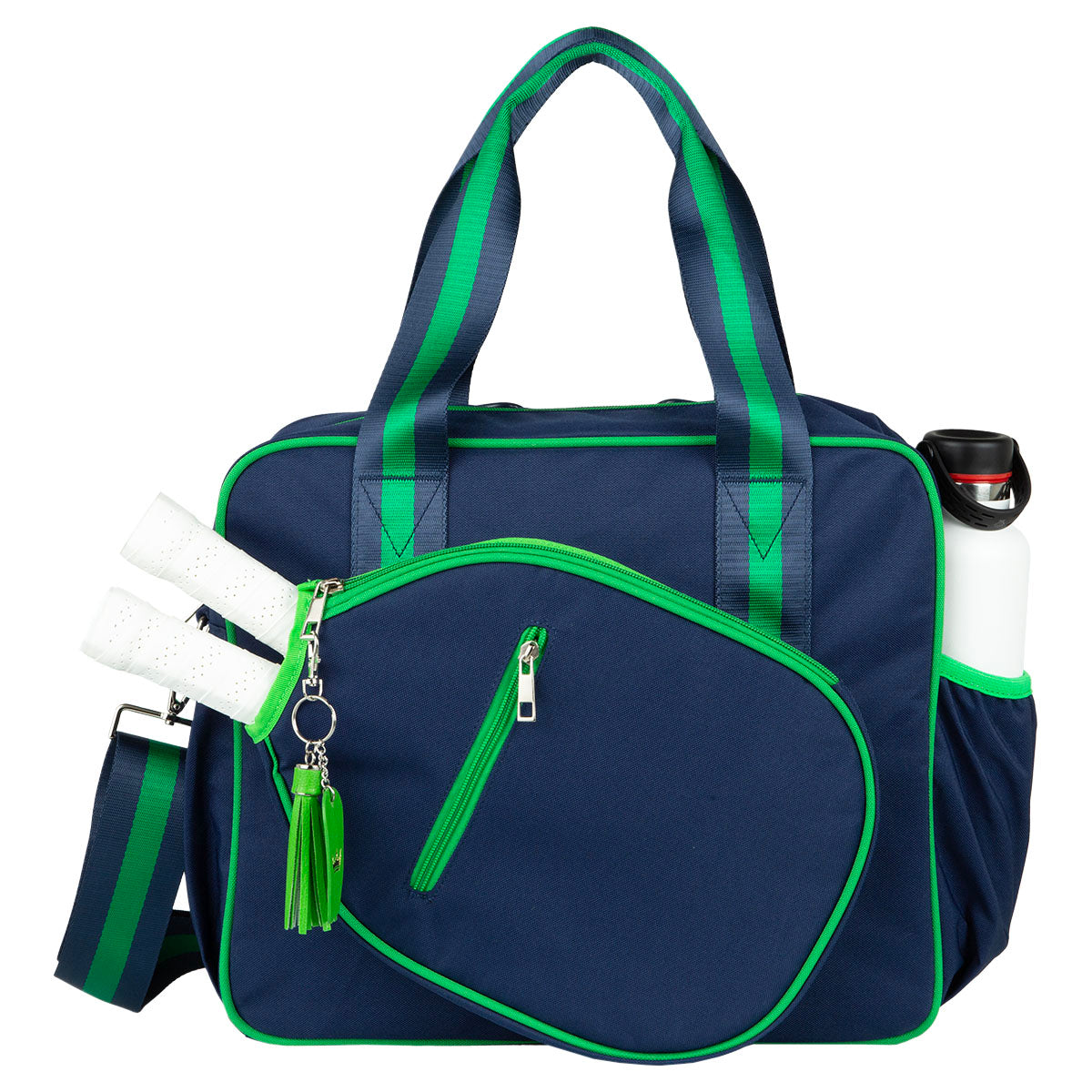 The Queen of the Court Prepster Pickleball Bag in navy with green trim features two handles, a shoulder strap, zippered pockets, and a green tassel keychain. Two white racket handles and a white water bottle are visible in side pockets.