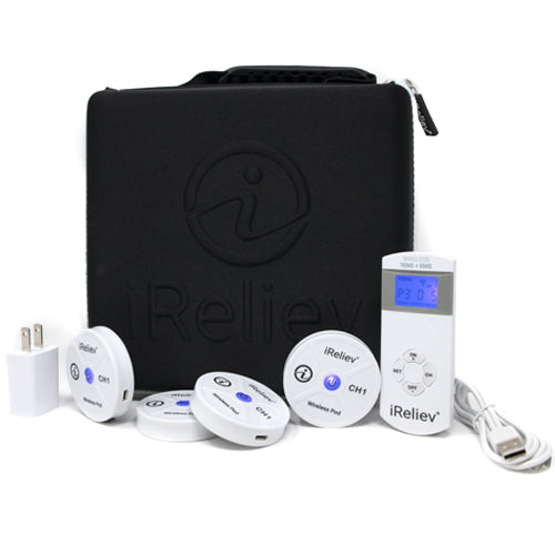 A black iReliev Hard Protective Carry Case for Wireless TENS EMS sits behind a white iReliev TENS unit, four round wireless electrode pods, a wall adapter, and a USB charging cable on a white surface.
