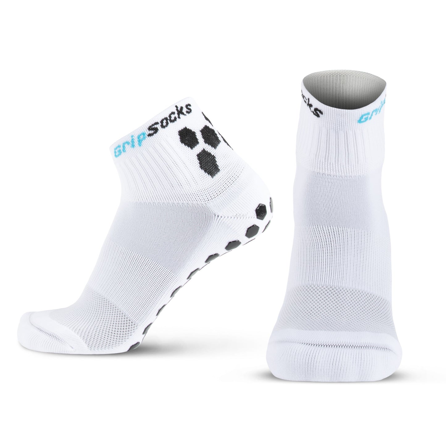 Two white GripSocks for Pickleball are shown: one reveals black hexagonal grip pads on the sole, the other shows the front. "Grip Socks" appears near the cuff. These 1/4 crew socks have ribbed cuffs and reinforced toe and heel areas.