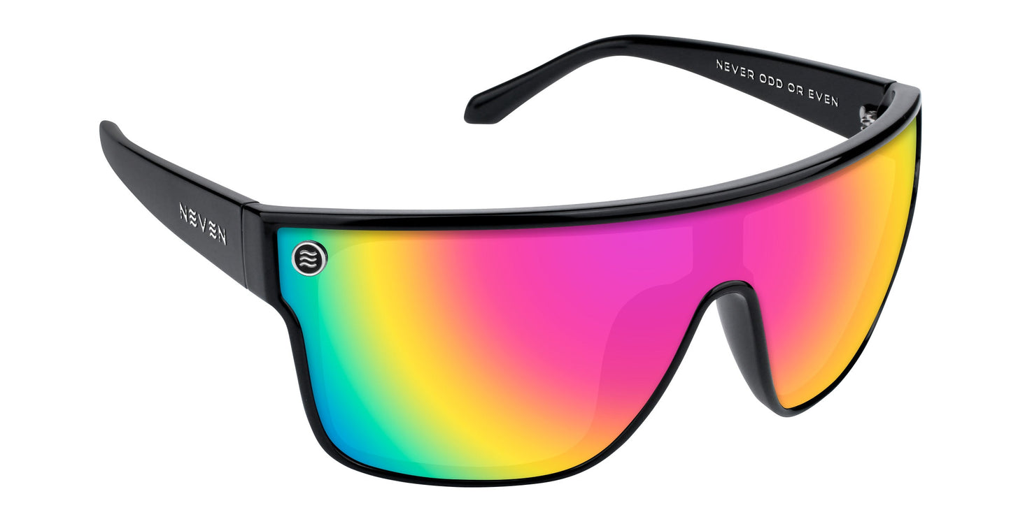 The Noosa by Neven Eyewear features black frames, a single large impact-resistant lens with a magenta-yellow-green gradient, "NEVER ODD OR EVEN" inside the arm, and a small silver logo on the front left.
