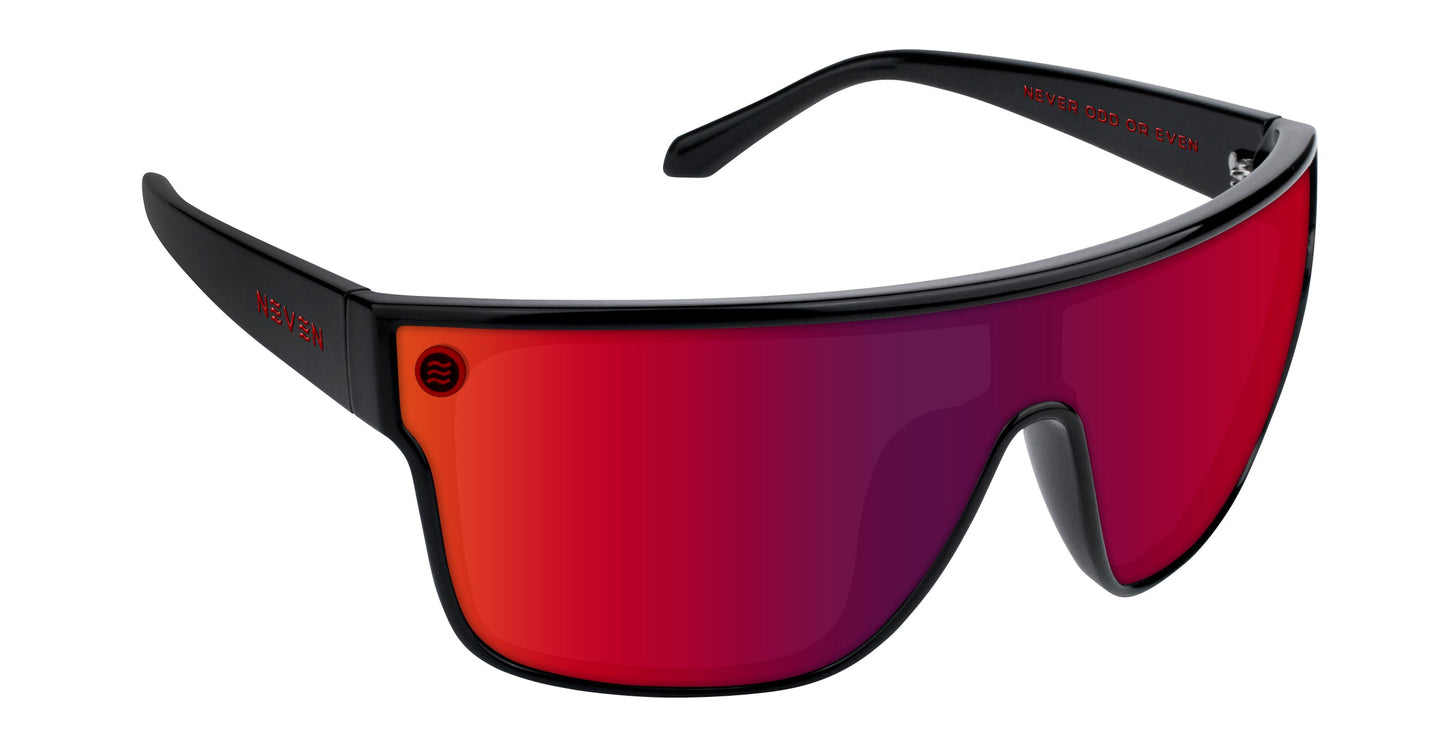 Neven Eyewear’s Well Done sunglasses are black wraparounds with a single large red mirrored impact-resistant lens. The sleek, gently curved arms feature subtle red text on the inside and outside of the frames.