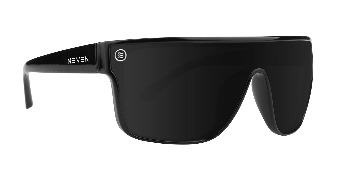 The Neven Eyewear Wire sunglasses feature a black, futuristic design with a single large, curved, impact-resistant lens and thick frame. "NEVEN" in white appears on the left temple; a small white logo sits on the lens’s top left. Plain white background.