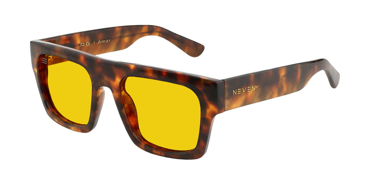 Amar by Neven Eyewear: bold tortoise shell sunglasses with thick rectangular frames, bright yellow lenses, text on the left arm, and NEVEN in gold on the right—a standout fashion accessory.