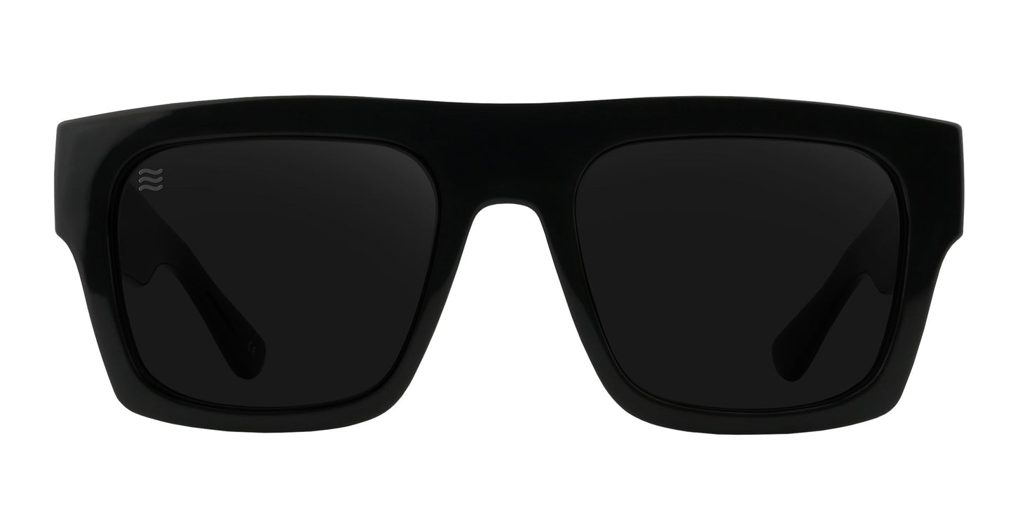 The Royce by Neven Eyewear are black rectangular polarized sunglasses with thick frames and dark-tinted lenses, viewed from the front on a white background. A small wavy logo appears on the upper left corner of the left lens.