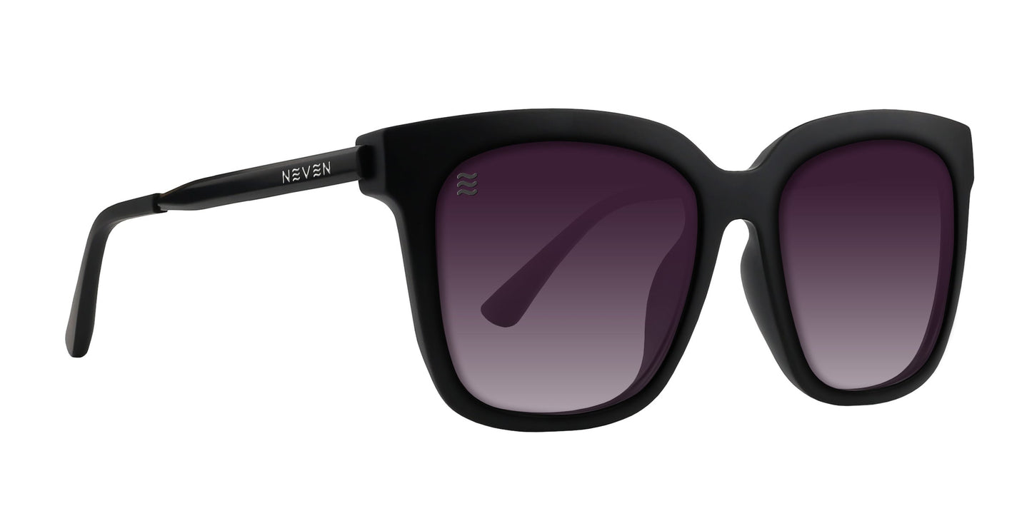 The Lido by Neven Eyewear features square matte black frames, dark gradient purple polarized UV400 lenses, and “NEVEN” in white on the left arm. These modern sunglasses provide large lenses for superior coverage.