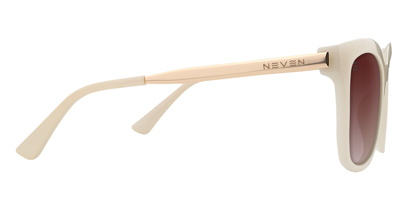 Side view of Sand Dollar sunglasses by Neven Eyewear, featuring gold metal arms engraved with the NEVEN logo, polarized brown-tinted lenses, and matching beige frames and temple tips for a modern, stylish look.