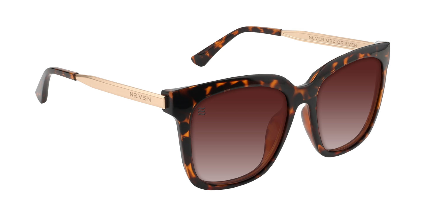 The Sarasota by Neven Eyewear are square polarized sunglasses with a tortoise shell frame, gold metal arms, and brown gradient UV400 lenses. "NEVER ODD OR EVEN" is printed inside the left arm for a modern touch.