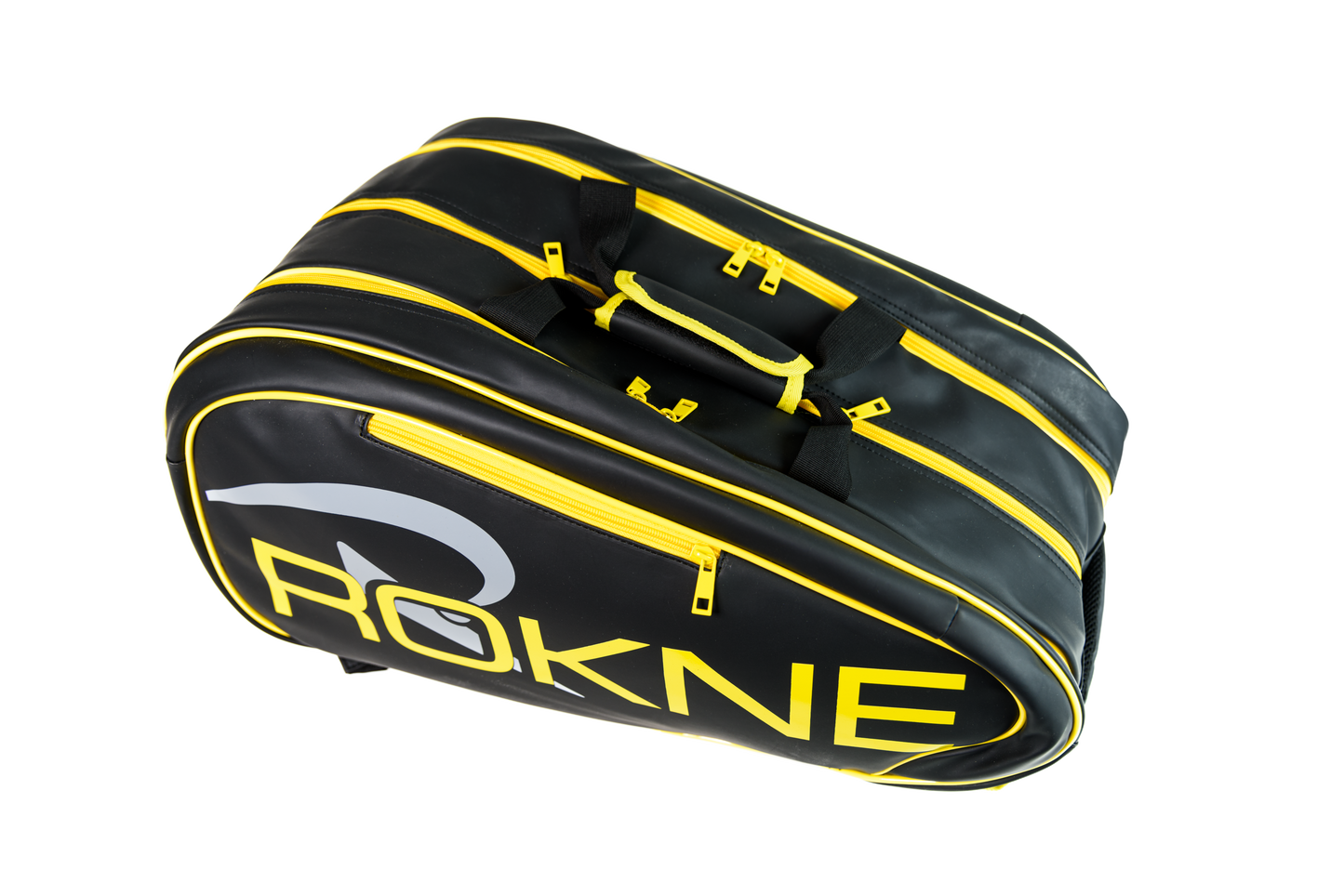 The ROKNE TOURNAMENT BAG is a black vegan leather sports duffel with yellow zippers and trim, bold yellow "ROKNE" lettering, a white logo, three zippered compartments, a ventilated shoe section, and padded handles with Velcro strap.