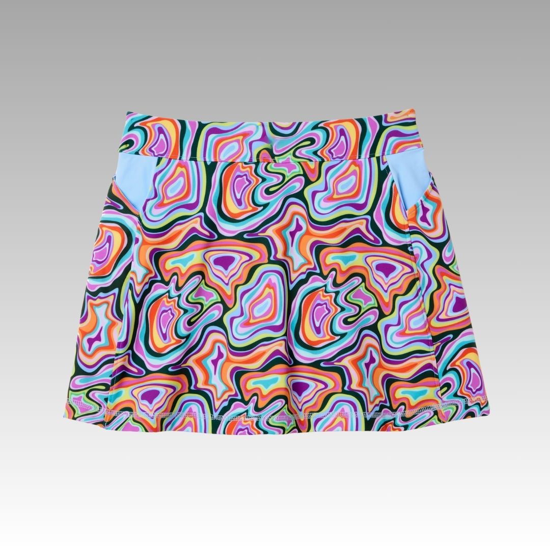 The Playly Store Sammy Skort 2.0 features a bold, psychedelic swirl pattern in vibrant colors, CoolFlow moisture-wicking fabric, a straight waistband, and side pockets—perfect for pickleball.