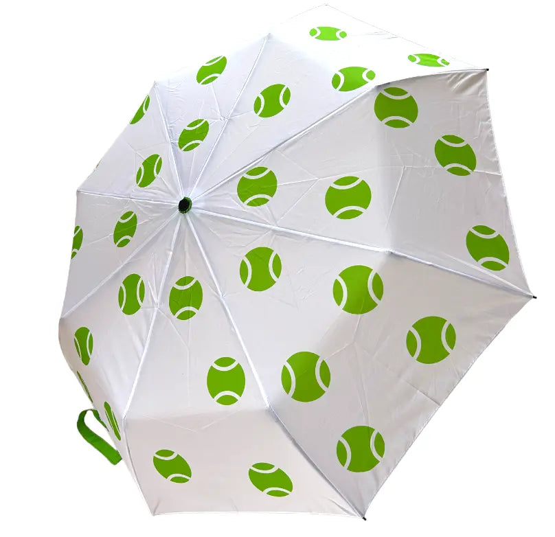 The Runway Athletics Umbrella - Green Tennis Balls is a white 21-inch umbrella with bright green tennis balls patterned across its 8 panels and a matching green handle partially visible at the bottom left.