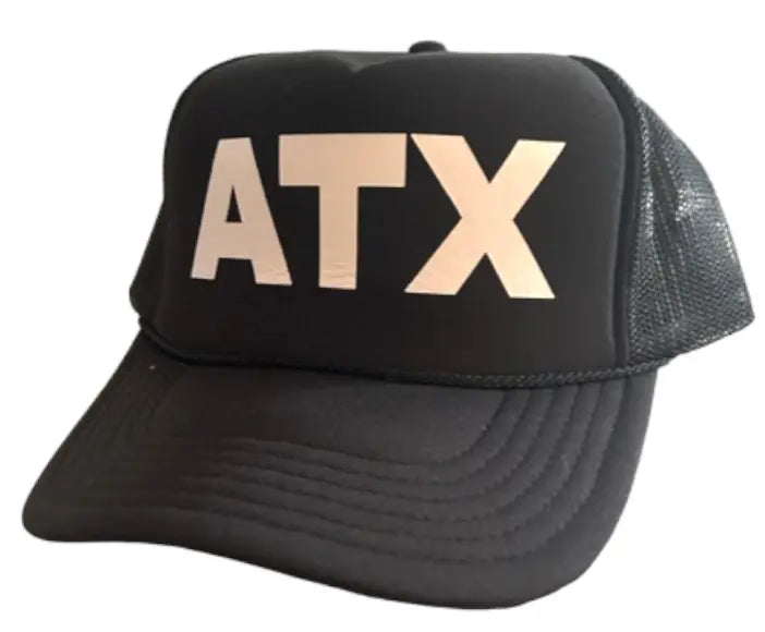 The Runway Athletics ATX Black Trucker Hat features bold matte white "ATX" lettering, a curved brim, and a breathable mesh back for a casual, sporty look.
