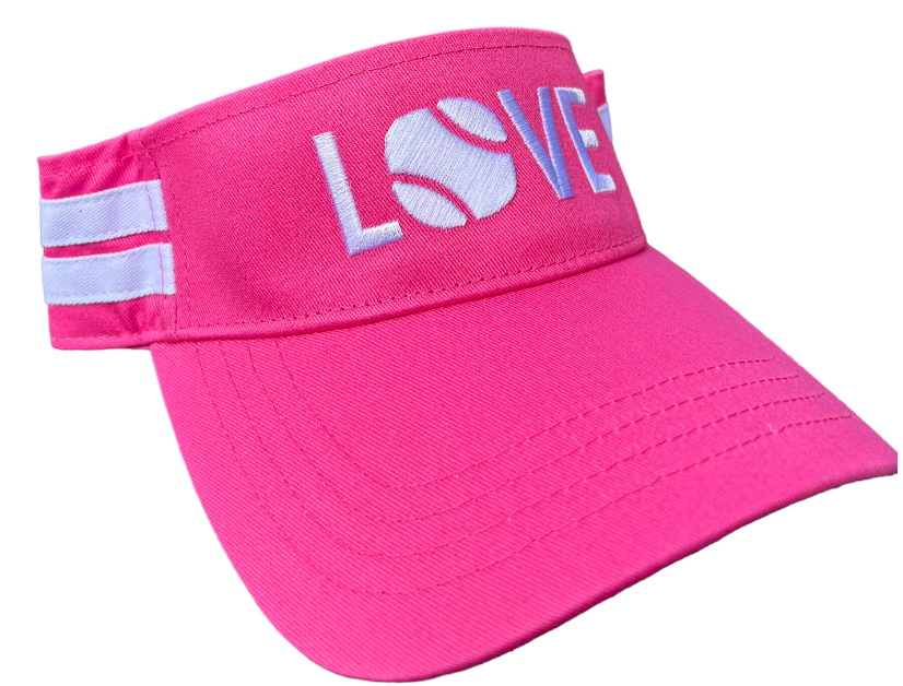 The Runway Athletics Striped Cotton Canvas LOVE Visor in bright pink features white stitched lines, two side stripes, and "LOVE" (with a tennis ball as the O) on the front. This adjustable cotton visor offers style and sun protection.
