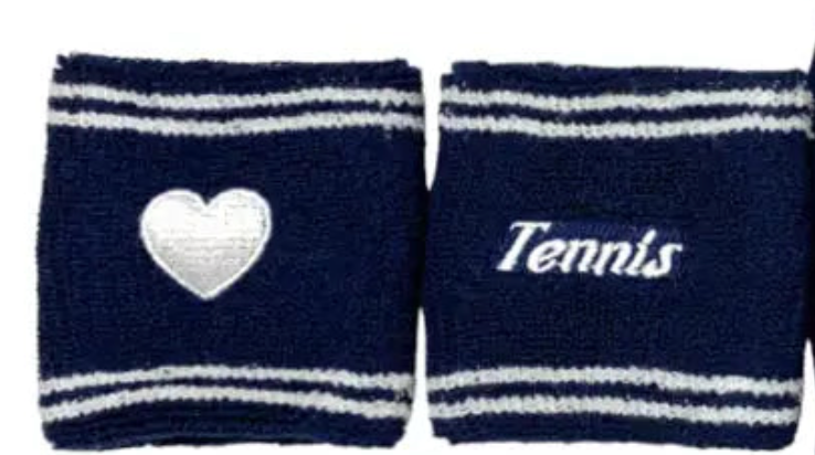 The Runway Athletics Runway Sweatband Set - Navy features two soft, dark blue cotton terry wristbands with white stripes: one with a white heart and the other with "Tennis" in script—perfect for tennis lovers.