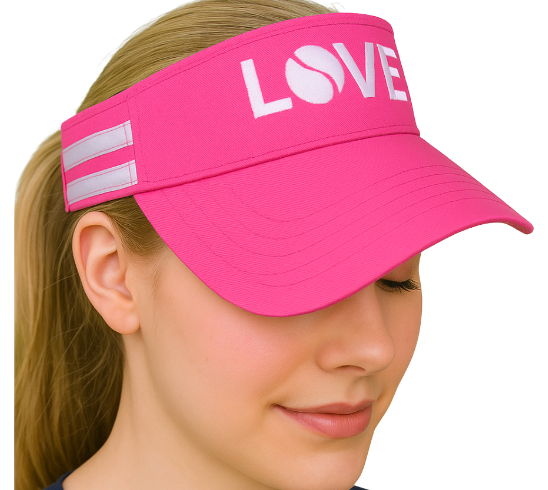 A woman with long blonde hair wears the Runway Athletics Striped Cotton Canvas LOVE Visor, featuring embroidered “LOVE” with a tennis ball 'O' and two silver reflective stripes for sun protection. She smiles softly with her eyes closed.