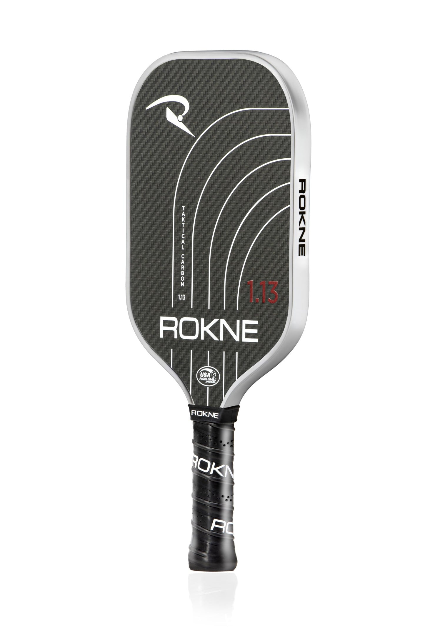 The ROKNE TAKTICAL CARBON 1.13 (13MM) is a black and silver carbon fiber pickleball paddle with curved white lines, red "1.13" model number, thermoformed edge, black grip tape branded “ROKNE,” and a USAPA approval seal at the base.