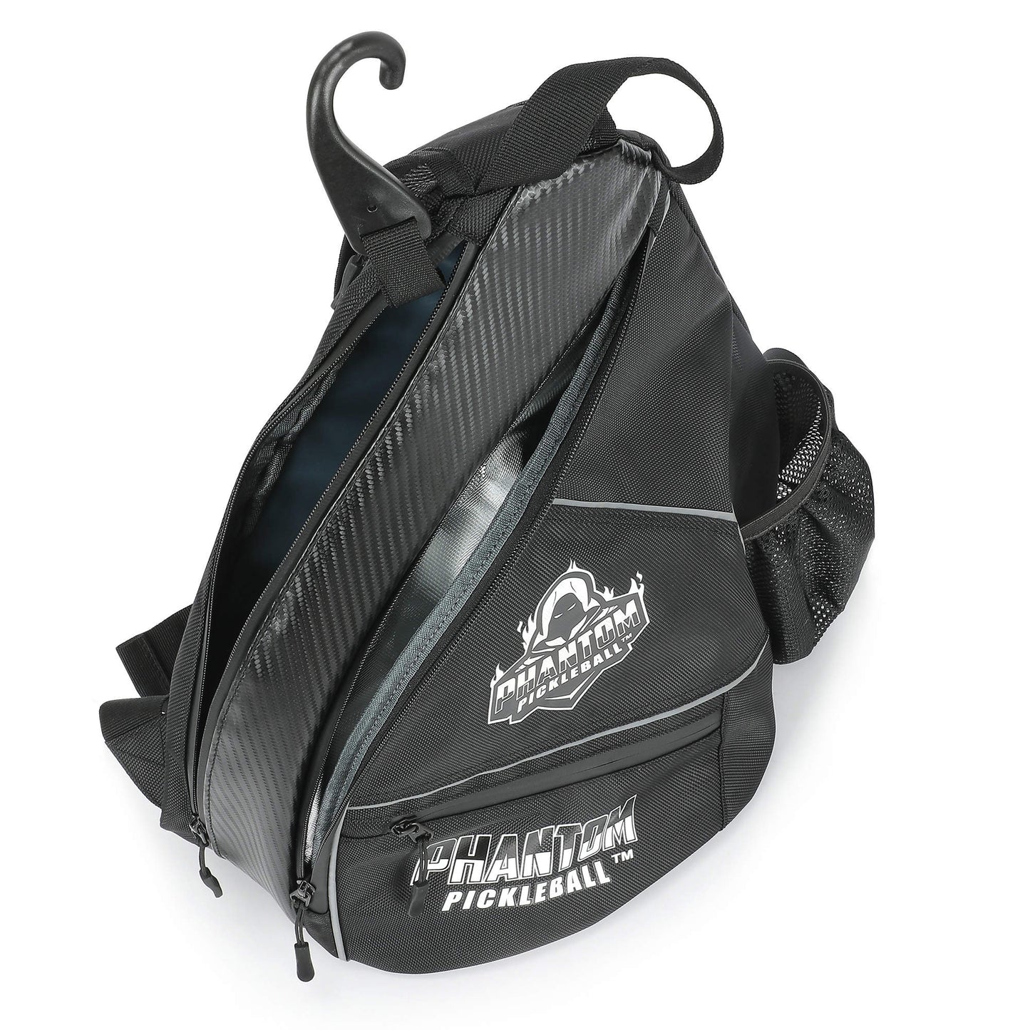 The Phantom Pickleball Sling Bag by Phantom Pickleball, in black, features multiple zippered compartments, a spacious interior for organizing gear, a bold white logo, and a side mesh pocket for easy access to your sports equipment.
