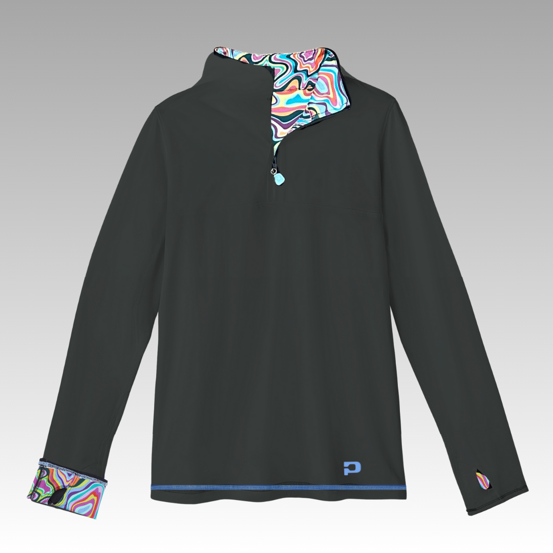 The Soleil Tech Shirt by Playly Store is a dark gray, long-sleeve half-zip pullover made from breathable fabric. It features a wavy, colorful pattern inside the collar and cuffs, plus a small blue P logo at the left hem.