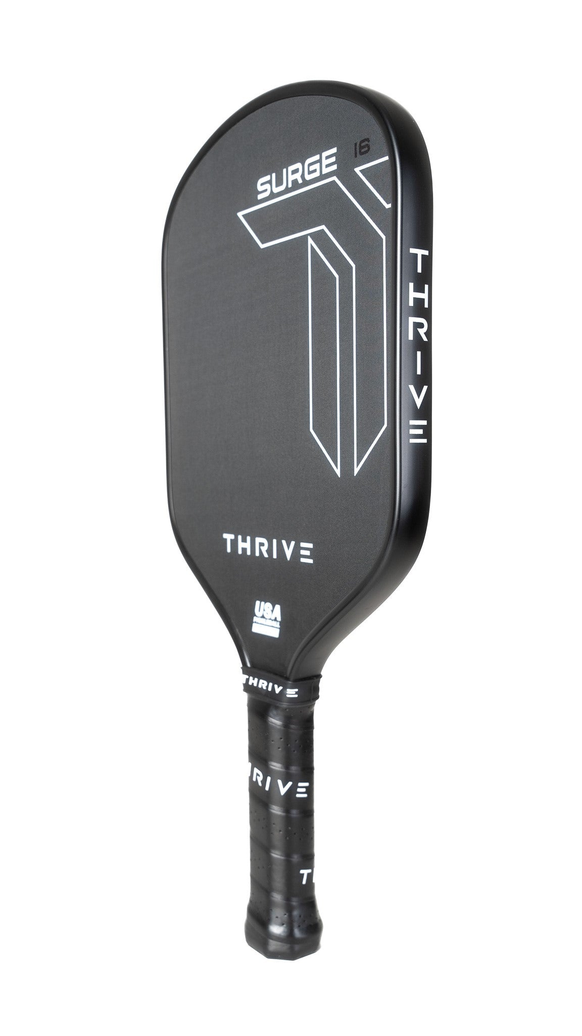The Thrive Pickleball Surge 16 MM (ALL COURT SERIES) paddle features a bold white geometric design, matte black carbon fiber surface, “SURGE 16” & “THRIVE” in white, textured grip tape, and comes with extras like lead weights and a paddle eraser.