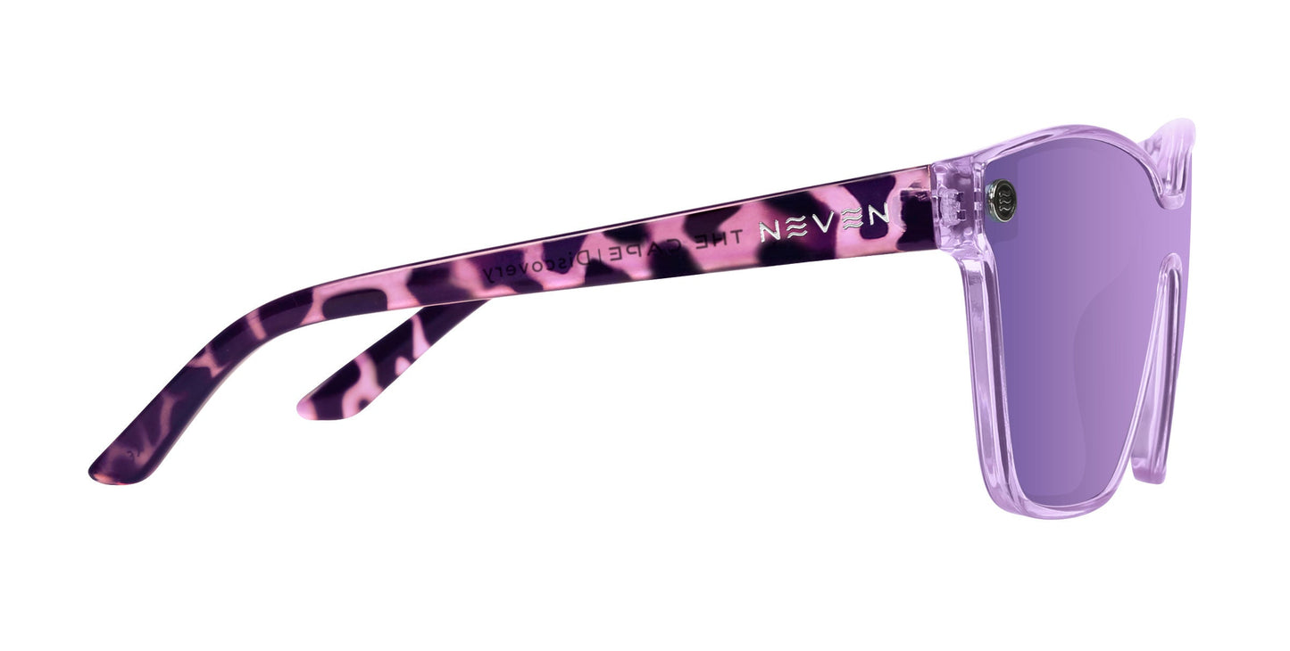 Side view of Neven Eyewear Discovery sunglasses with translucent purple frames and matching polarized UV400 lenses. Arms display a bold pink and black leopard print and “NEVEN” in white.