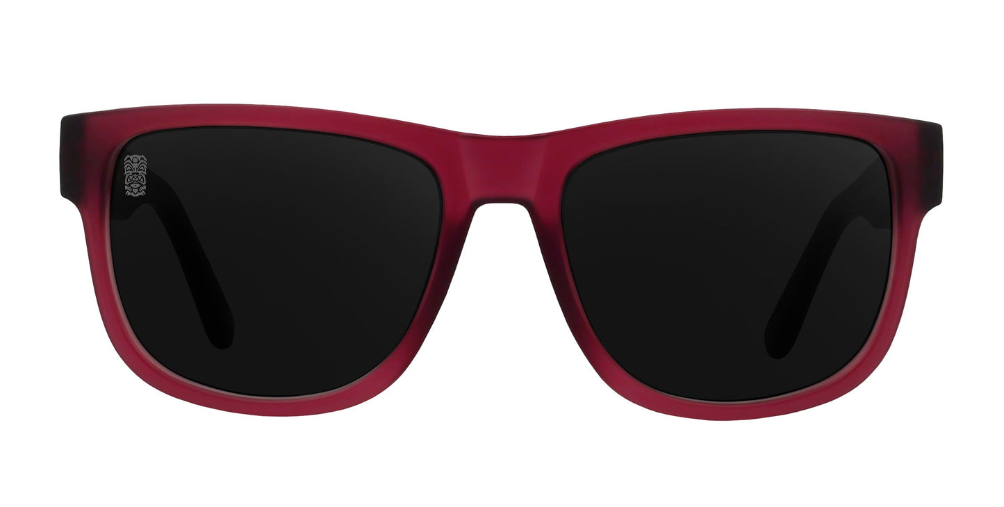 The Neven Eyewear Plasma sunglasses feature a matte, translucent dark red plastic frame with large rectangular black polarized lenses and a silver hinge detail on the left temple, displayed facing forward against a white background.