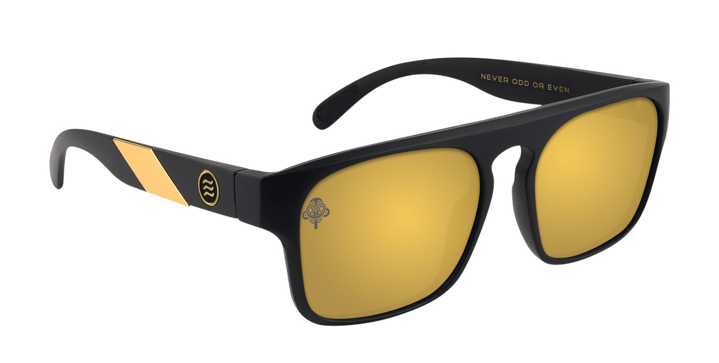 Golden Banana by Neven Eyewear: black rectangular sunglasses with gold-mirrored polarized UV400 lenses, glossy finish, gold diagonal accent, small circular symbol, and "NEVER ODD OR EVEN" in gold inside the right arm. Modern and stylish.