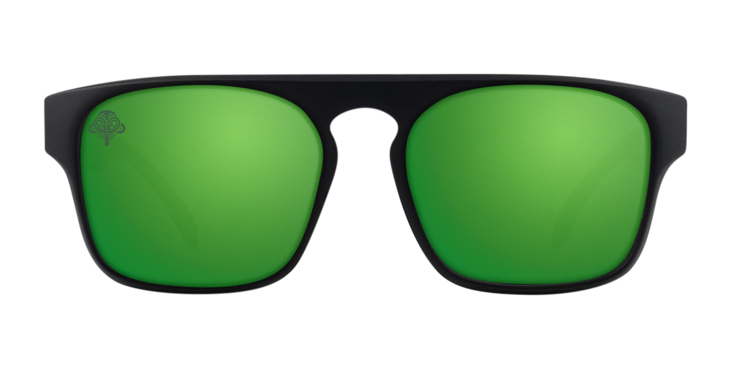 A pair of Neven Eyewear Primatology sunglasses with black frames and large rectangular green mirrored polarized lenses face forward, featuring a small Dirt Monkey logo on the upper left corner of the left lens against a plain white background.