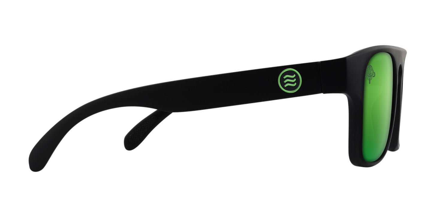 Side view of Neven Eyewear Primatology sunglasses featuring a matte black frame, green mirrored lenses, curved arms, a green circular wave logo on the temple, and a subtle tree symbol on the inner hinge for a stylish look.