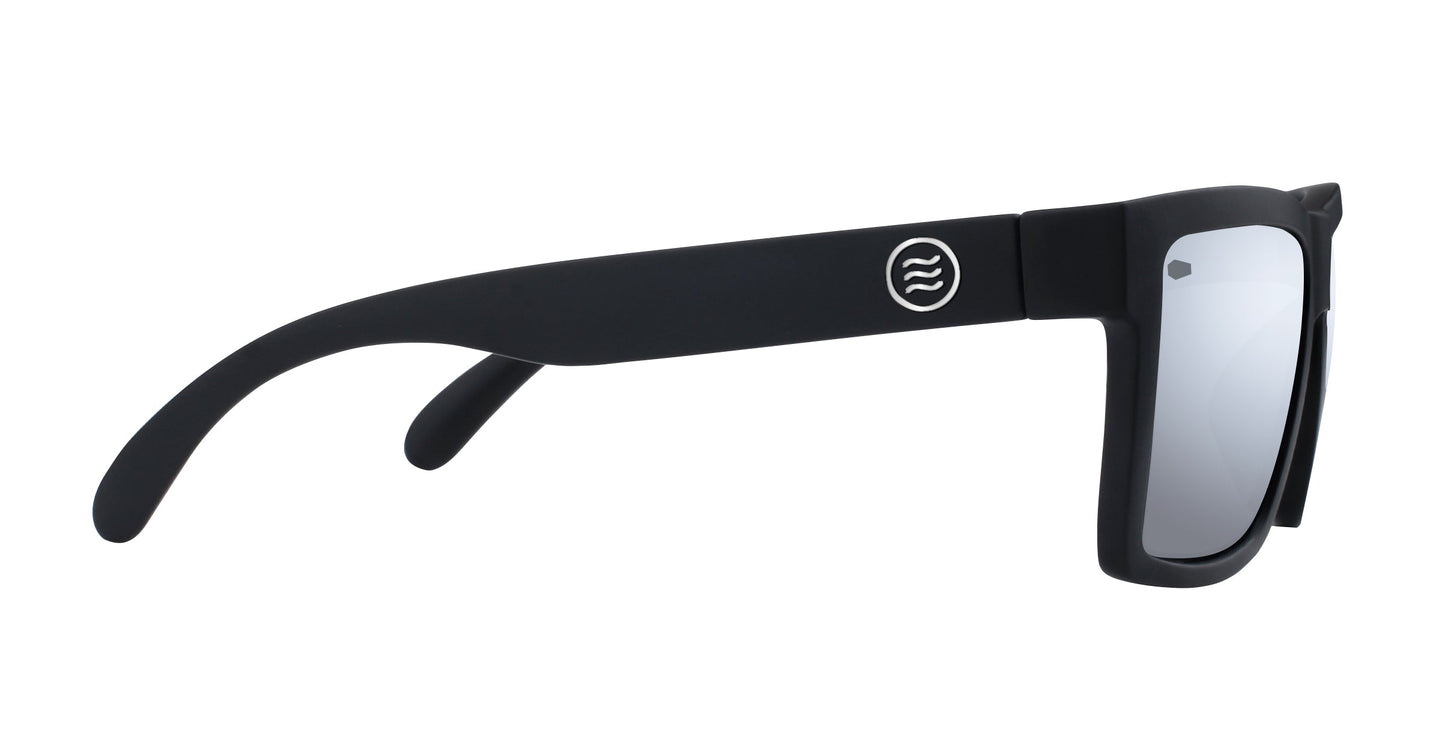 The Neven Eyewear Ace sunglasses feature black, thick frames and mirrored polarized UV400 lenses. A white circular logo with wavy lines accents the wide temple arm. Shown from the side on a plain white background.